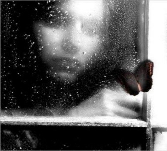 GirlInWindowRainResized.jpg
